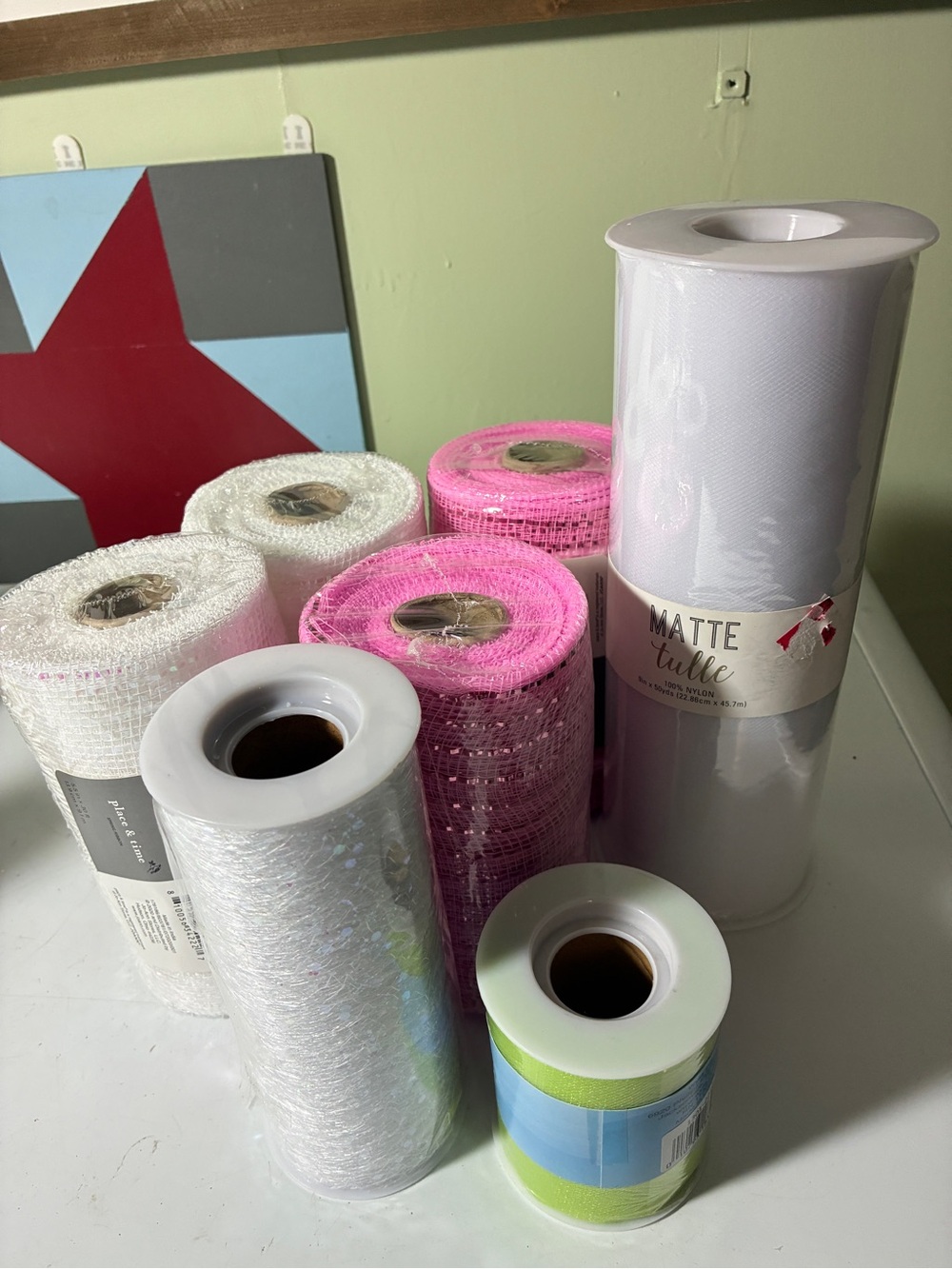 Assorted Craft Mesh and Ribbon Rolls in White and Pink. 7 rolls all opened